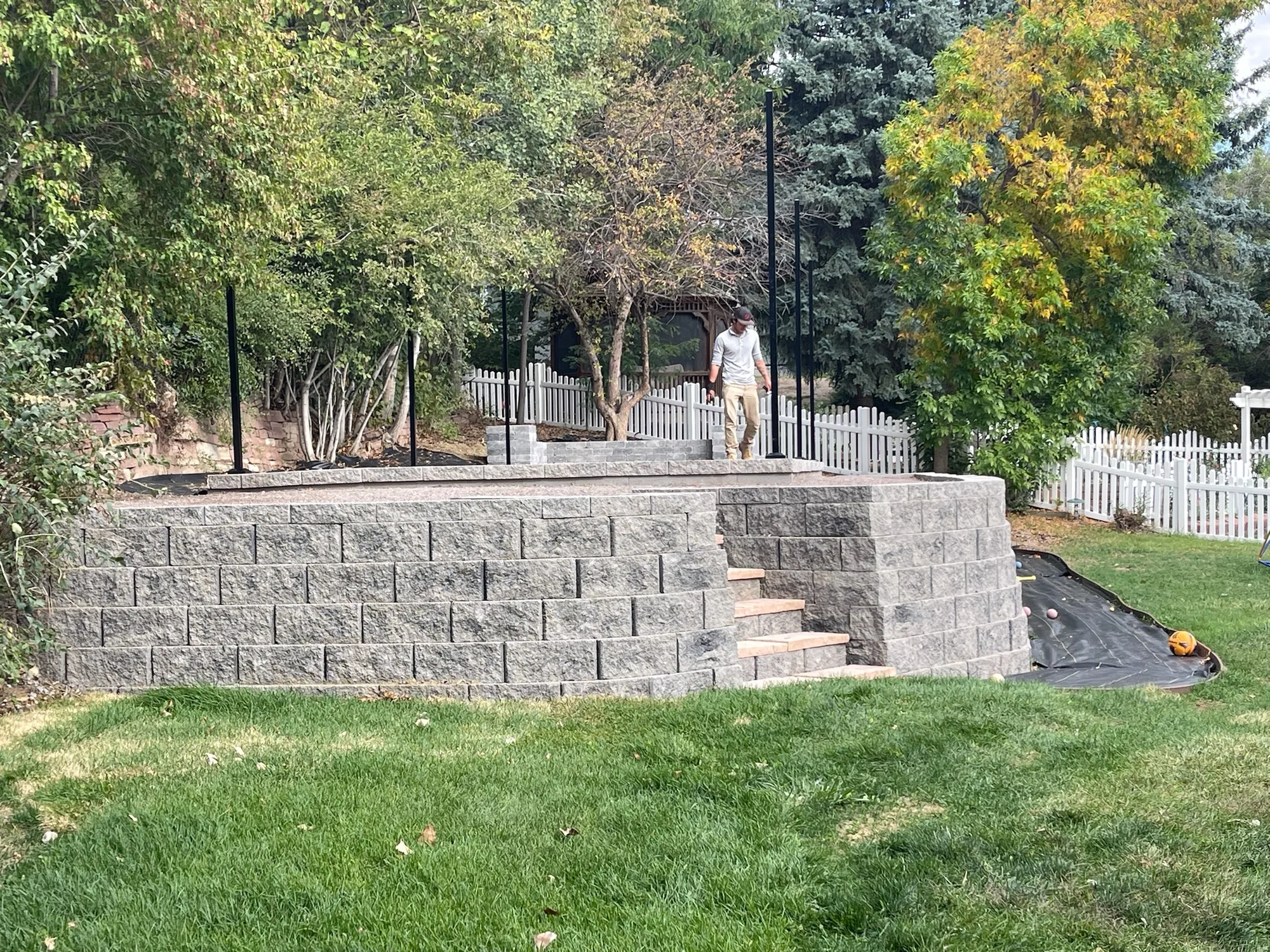 Completed retaining terraces transitioning into lawn