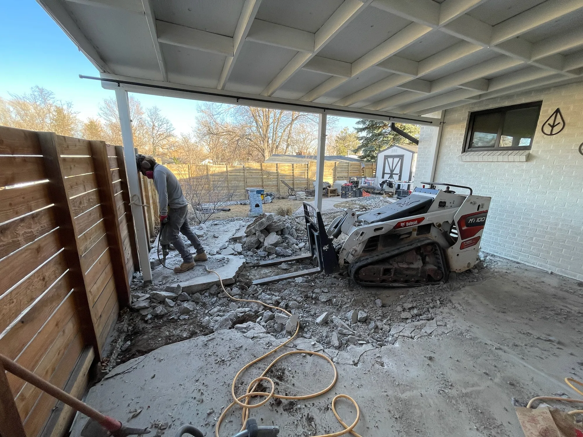 Covered patio demolition and site preparation