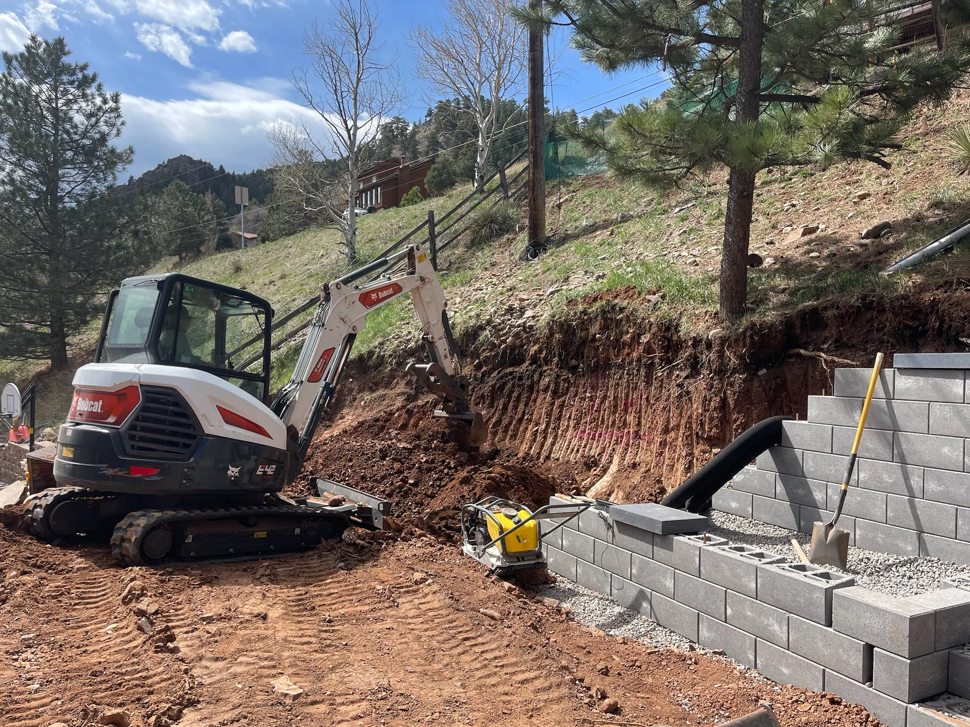Retaining wall construction on a steep residential slope