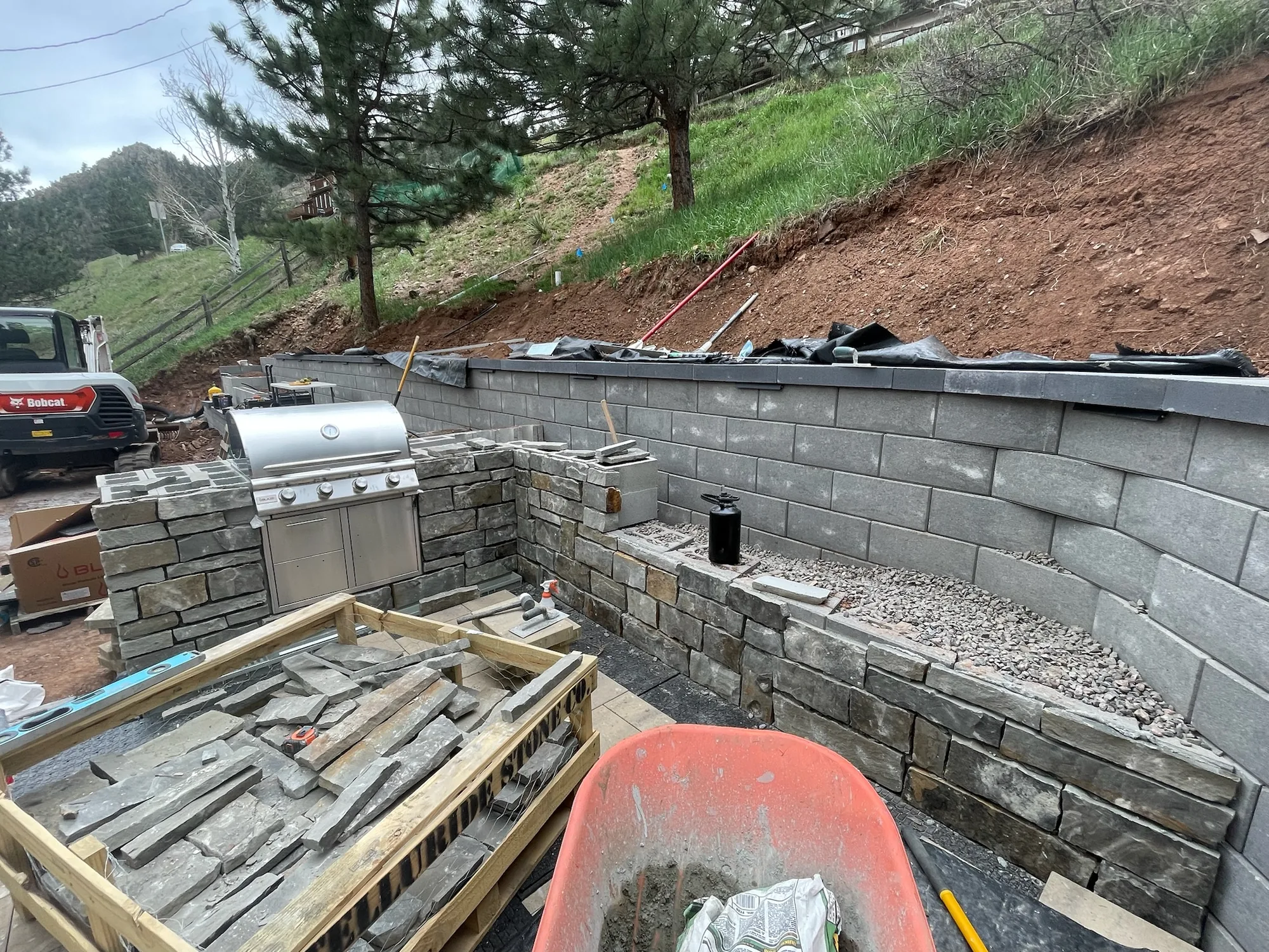 Curved retaining wall nearing completion