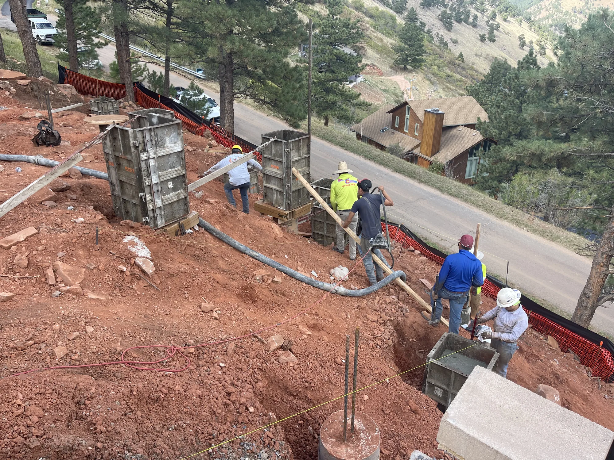 Concrete wall construction on a steep mountain site