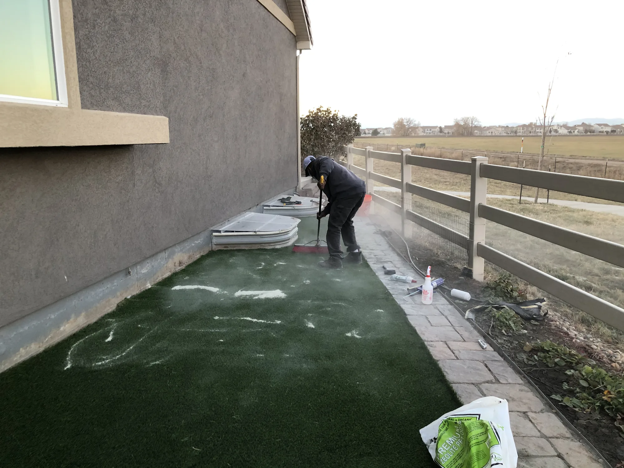 Turf installation along a narrow side yard