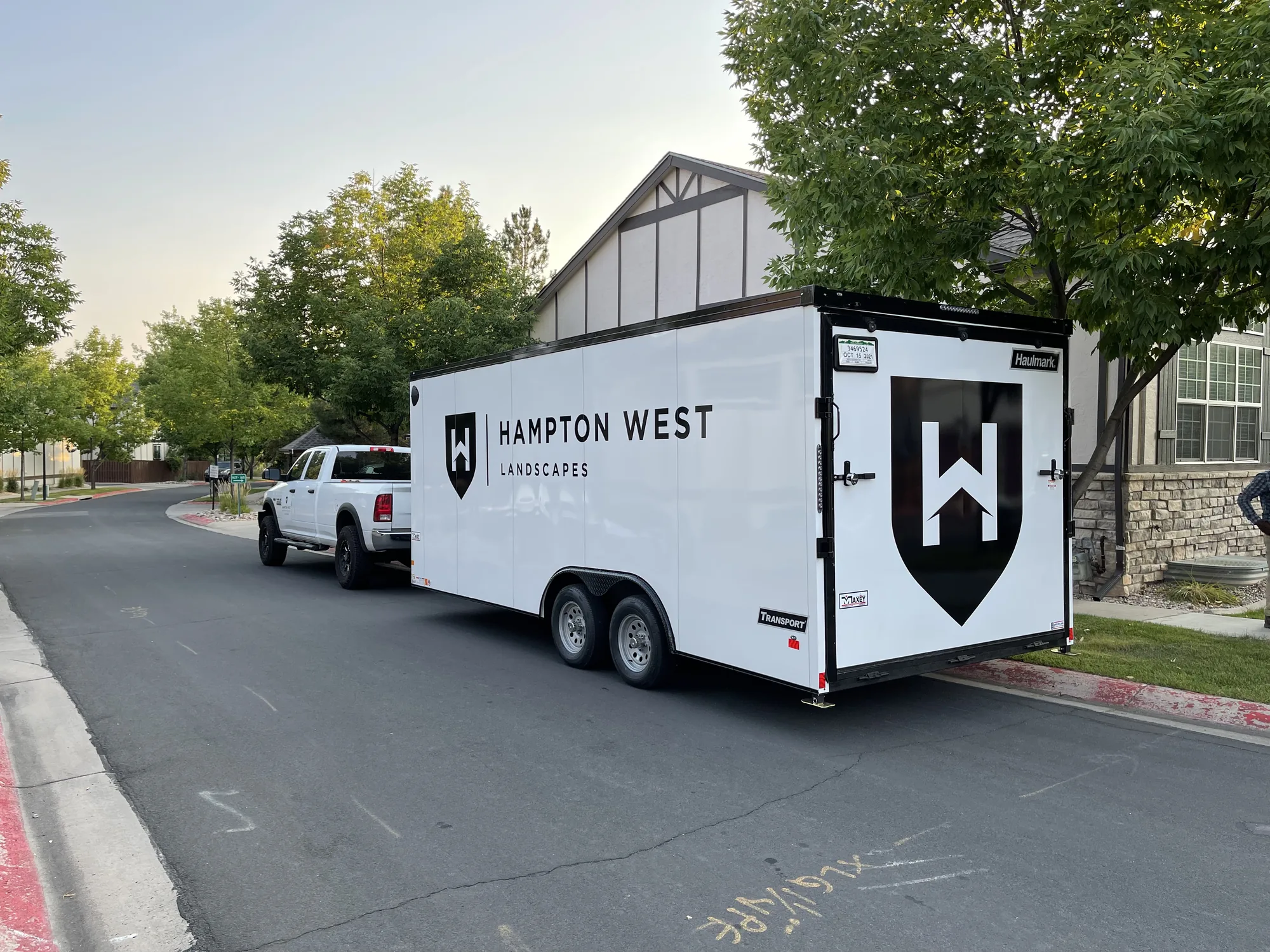 Landscape crew mobilization with truck and enclosed trailer